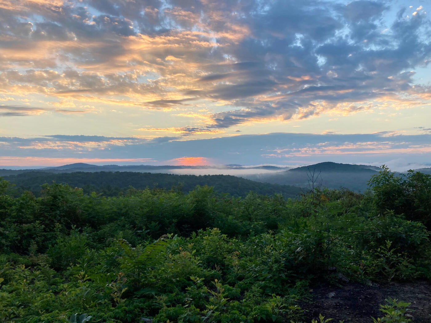Sunrise over the misted ridges around Speedwell